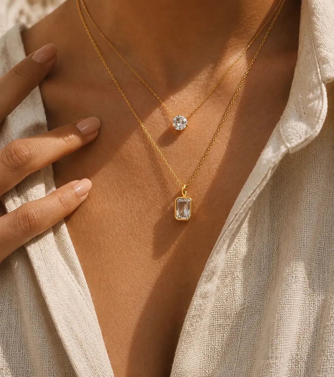 Necklaces — layered gold-plated zircon pendant necklaces worn at the collarbone, Banana & Kale