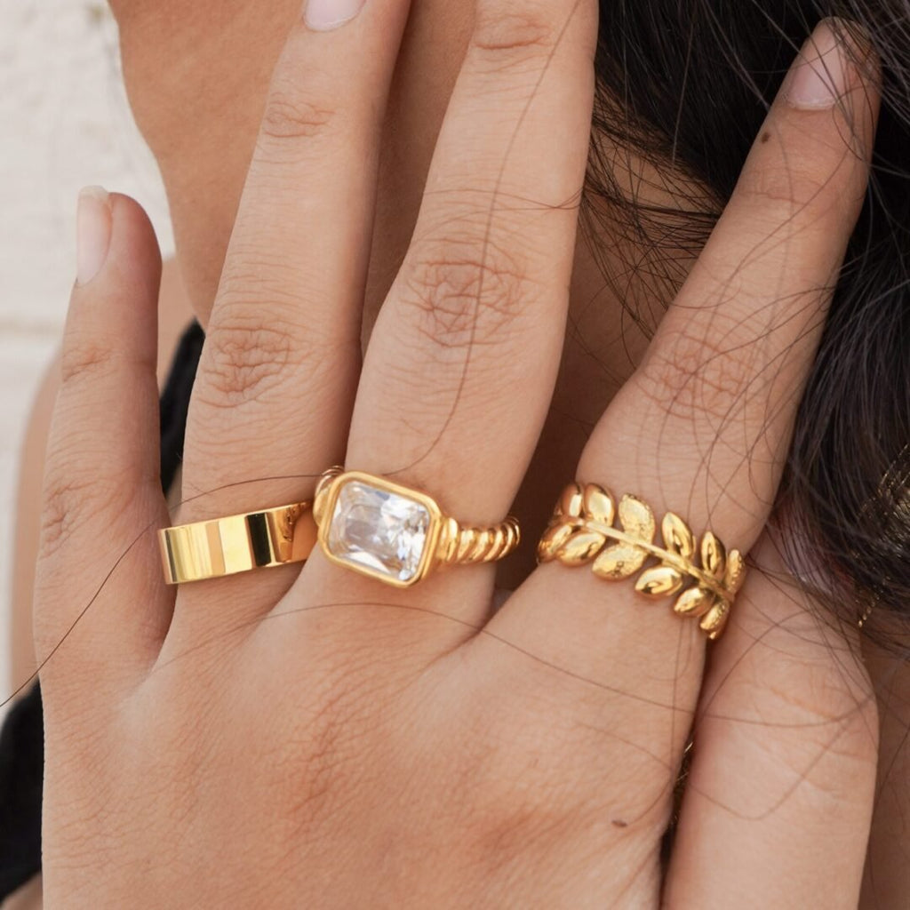 Dolce Ring — wide gold band worn on the finger