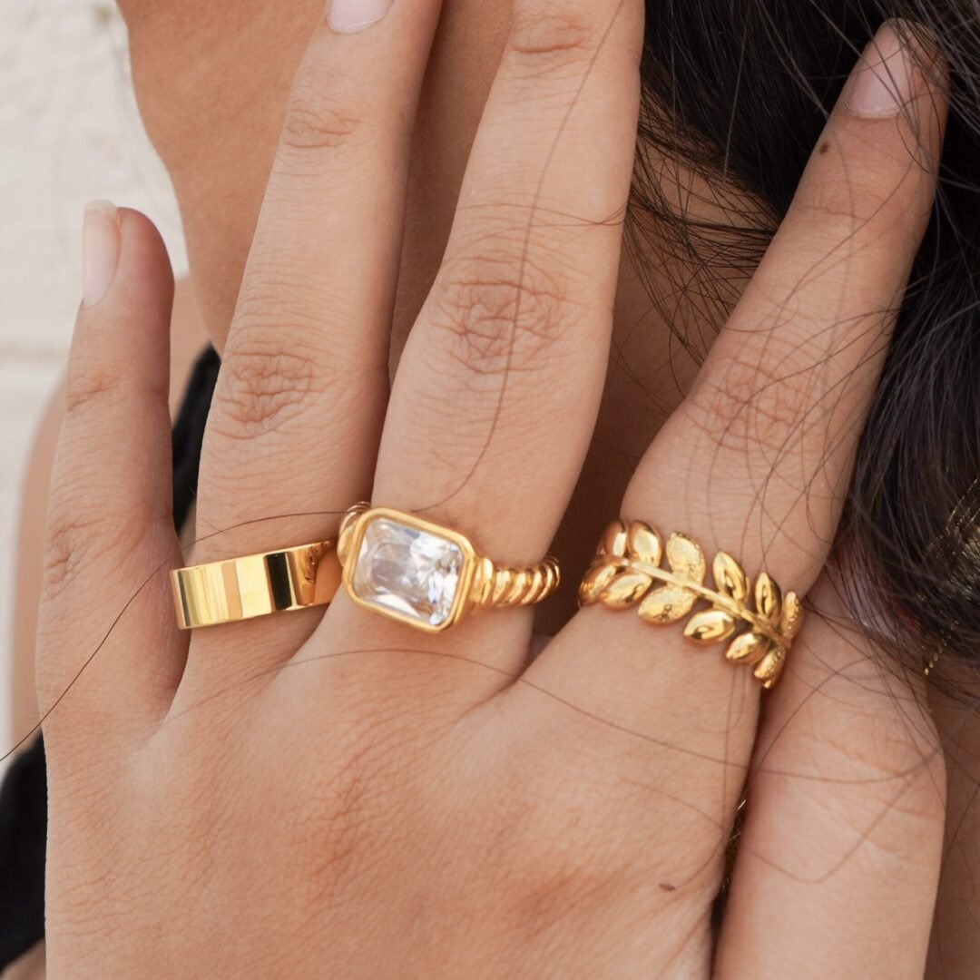 Dolce Ring — wide gold band worn on the finger