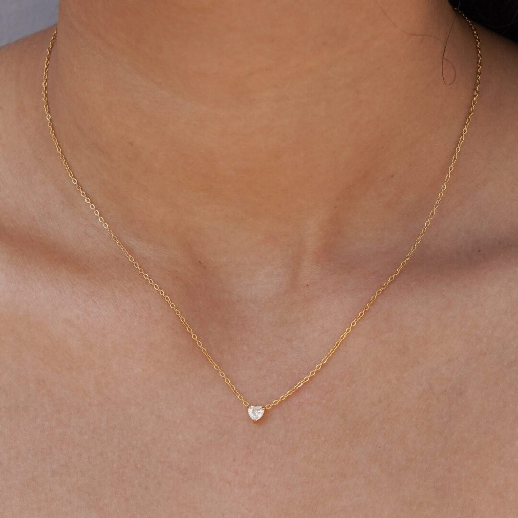 Darling — zircon necklace worn just below the collarbone