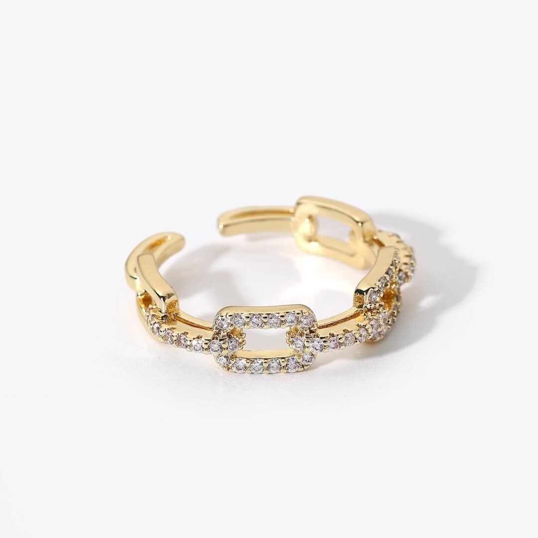 Link Ring White — adjustable cubic zircon link ring in 18k gold plating, front view