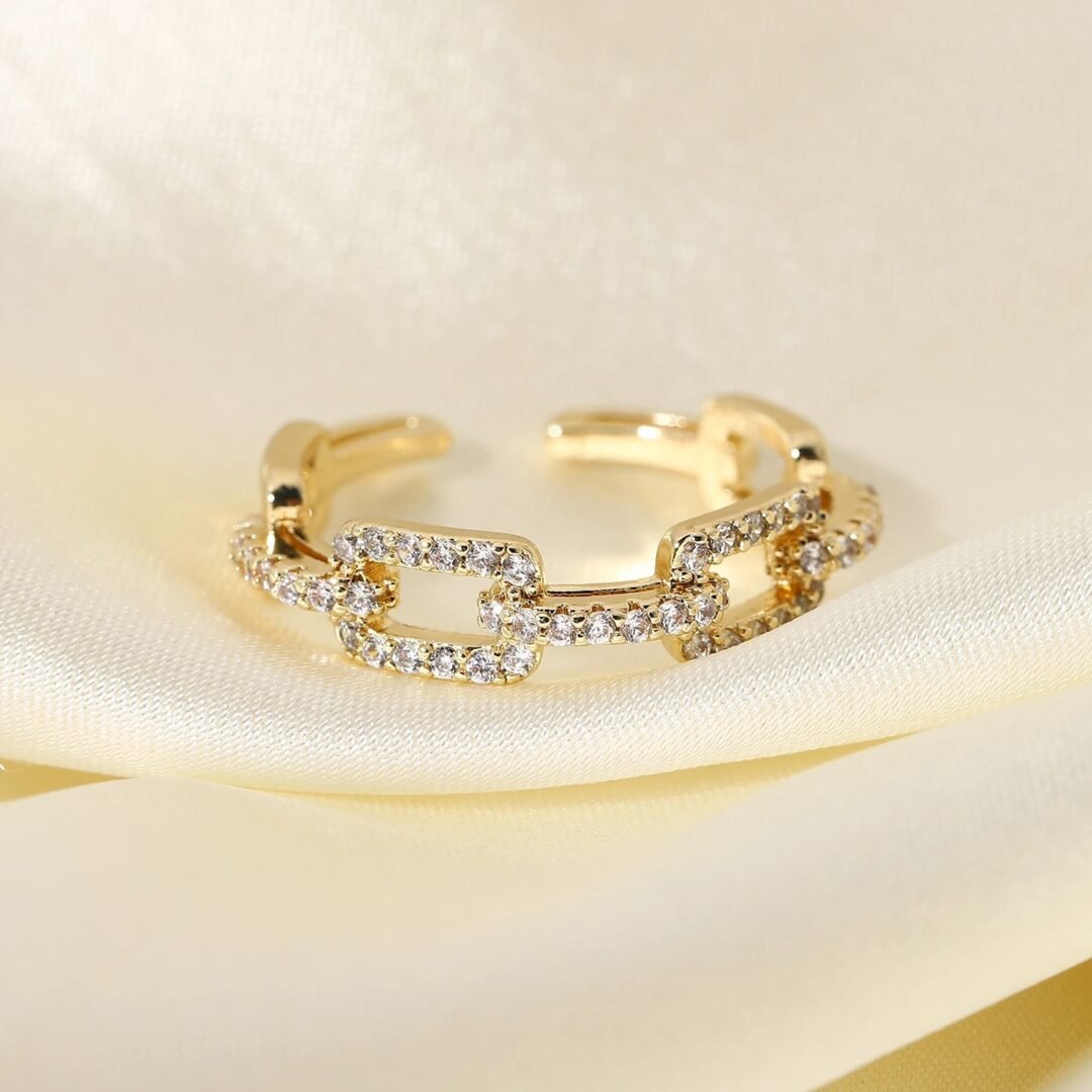 Link Ring White — gold-plated zircon link ring worn on the finger
