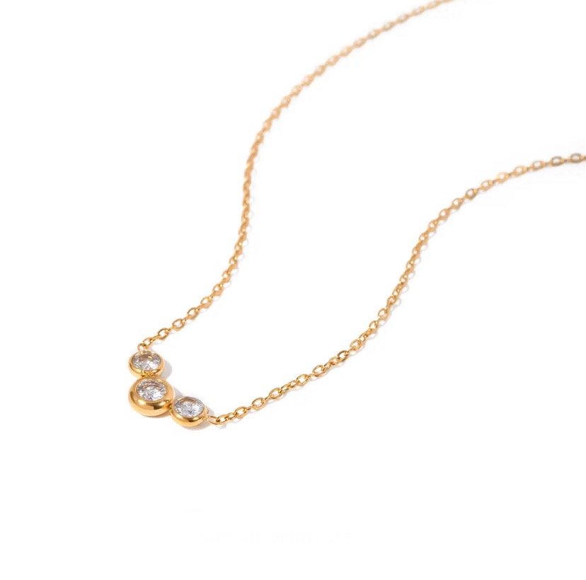 Trix — zircon pendant necklace in 18k gold-plated stainless steel, front view