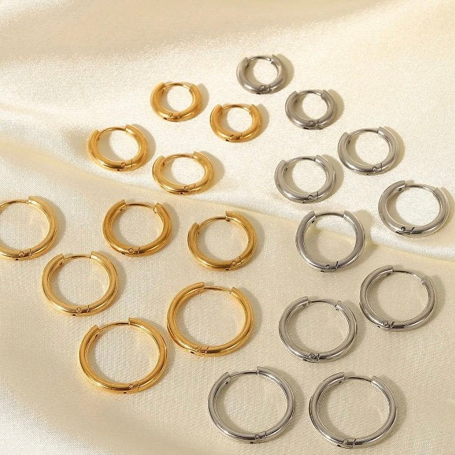 Silver Huggies — silver-plated huggie hoop earrings in three sizes