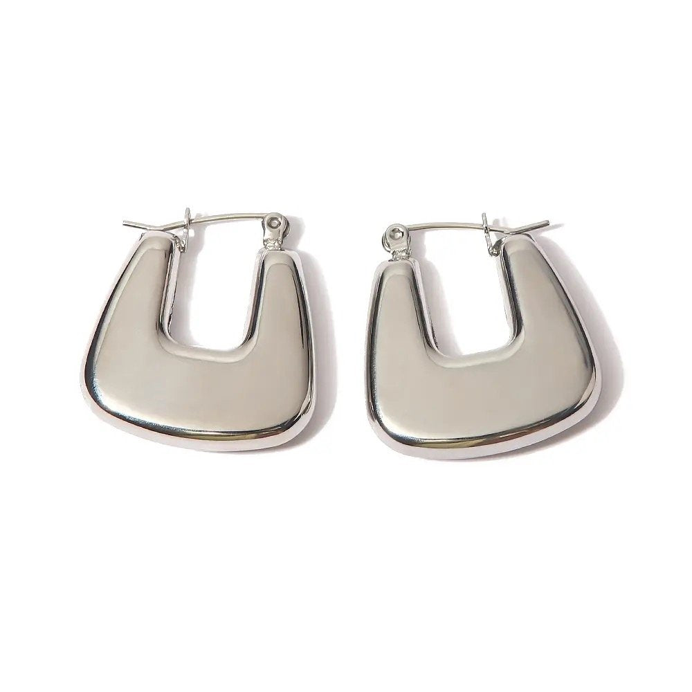 Bianca Hoops Silver — plain silver hoop earrings in silver-plated stainless steel, front view