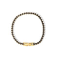 Black Tennis Bracelet — black zircon tennis bracelet in 18k gold-plated stainless steel