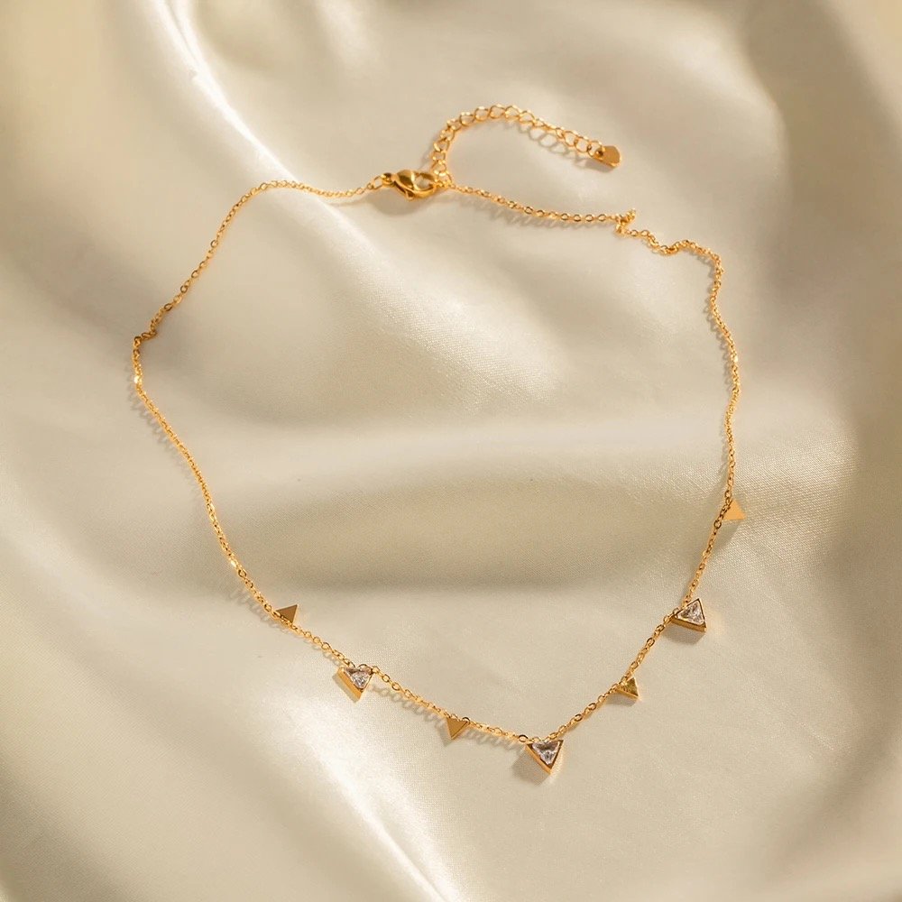 Tiah — zircon necklace styled flat lay