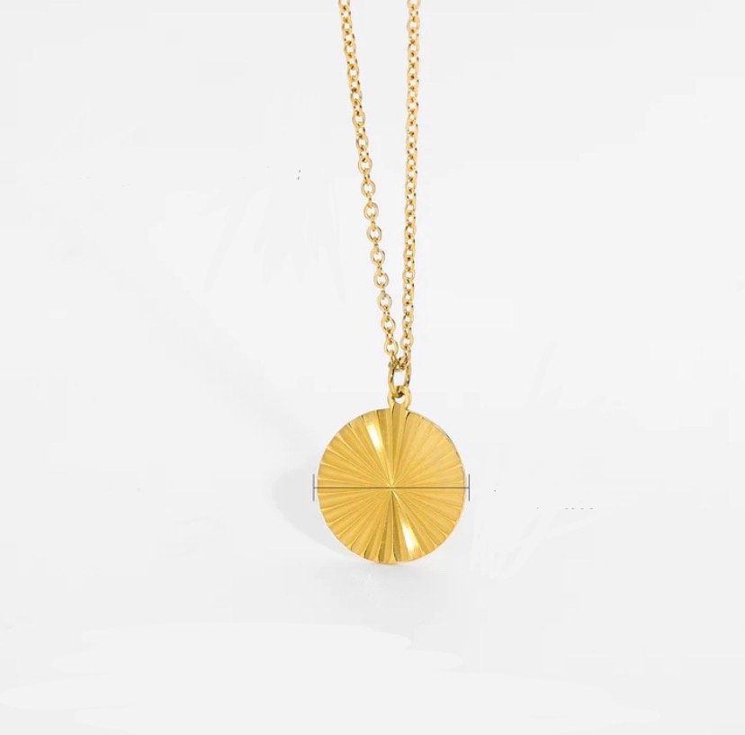 Insurgent — flat disc pendant necklace in 18k gold-plated stainless steel, front view