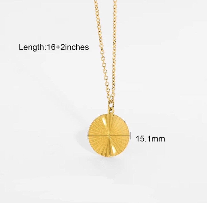Insurgent — close-up of matte gold disc