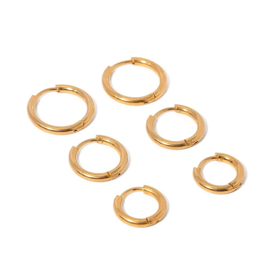 Huggies Set — set of 18k gold-plated huggie hoop earrings, front view