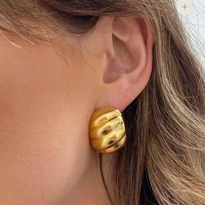 Elara Hoops — slim gold-plated hoops worn on the ear
