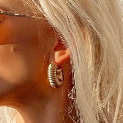 Isadora Hoops — gold hoops worn on the ear