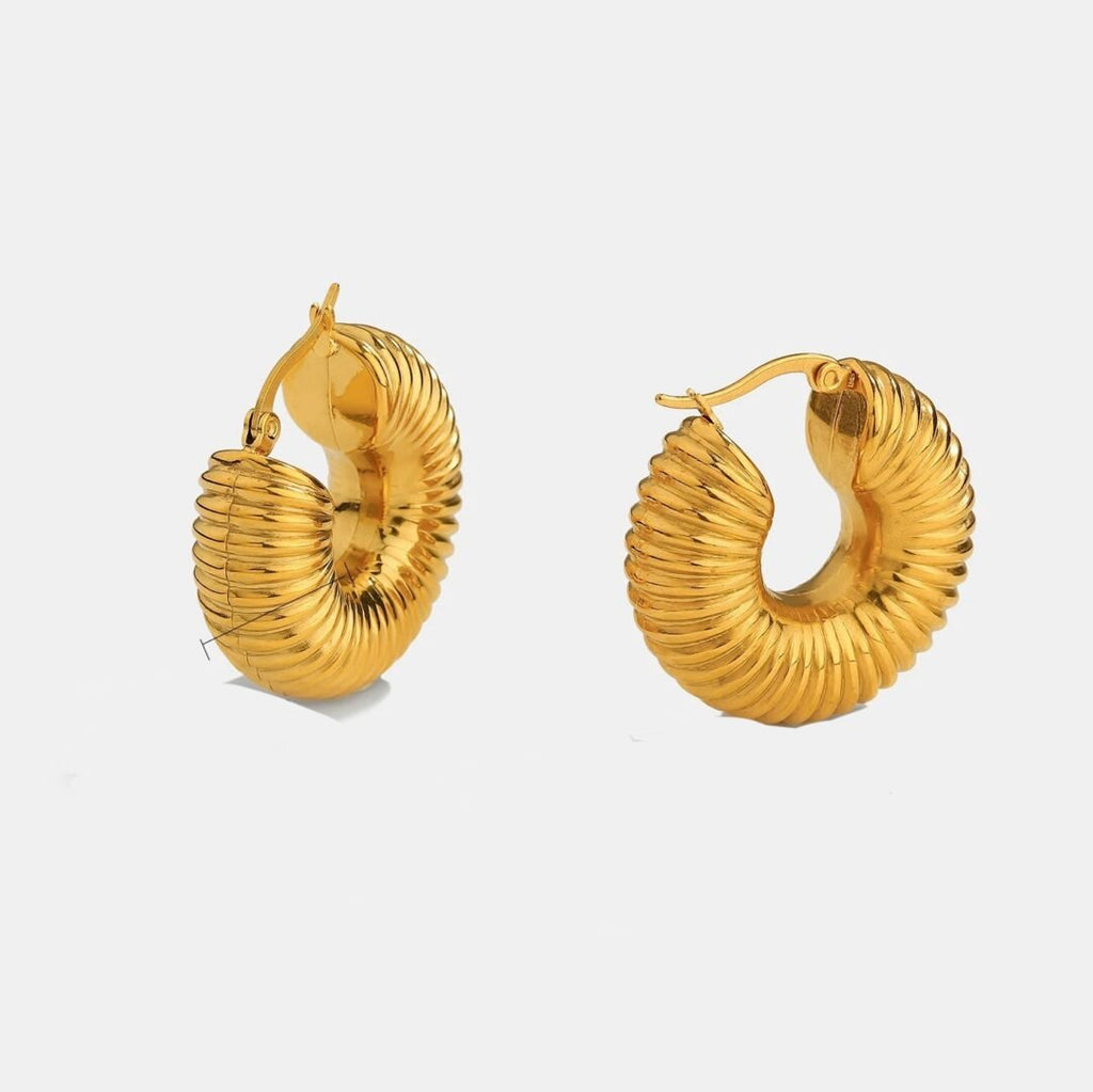 Isadora Hoops — plain gold hoop earrings in 18k gold-plated stainless steel, front view