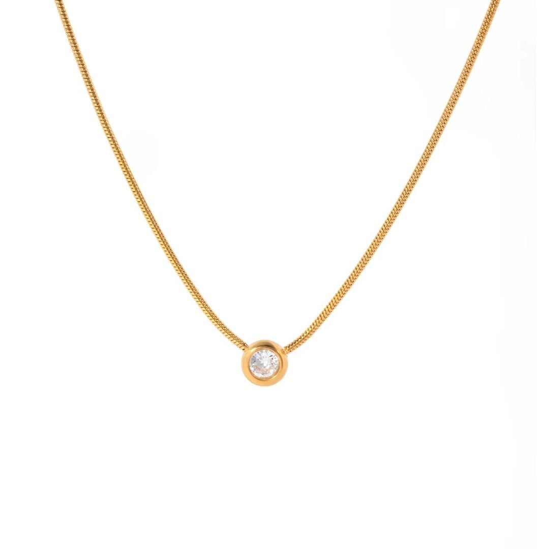 Astra Gem — raised zircon pendant necklace in 18k gold plating, front view
