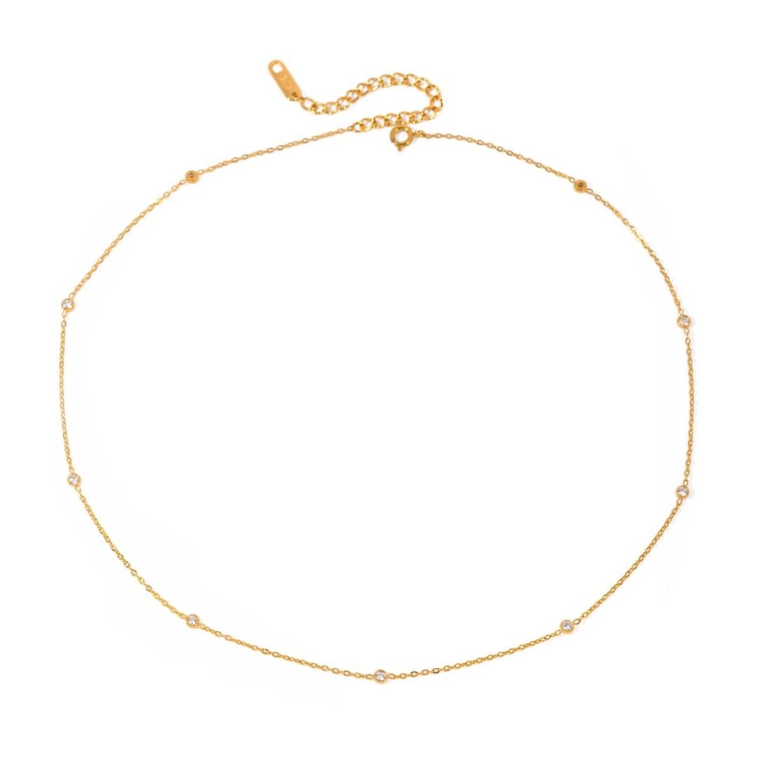 Lila Necklace — gold-plated zircon pendant worn at the collarbone