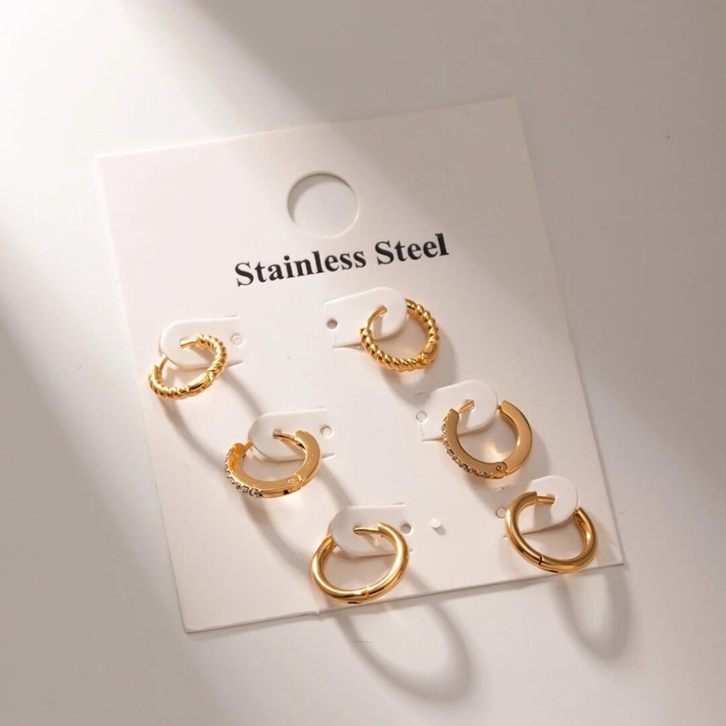 Classic Huggies Set — huggie hoops worn across multiple piercings