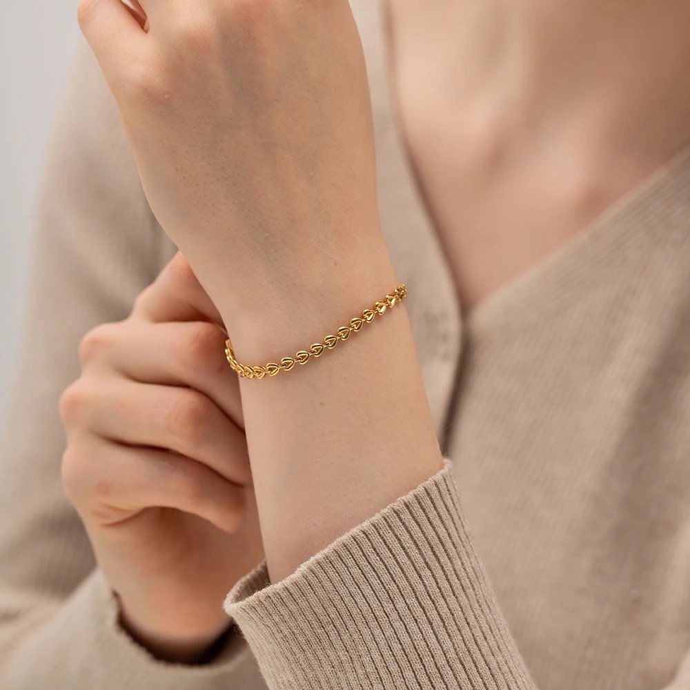 Heartfelt Bracelet — gold-plated heart bracelet worn on the wrist
