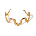Wave Cuff — wave open cuff bracelet in 18k gold-plated stainless steel, front view