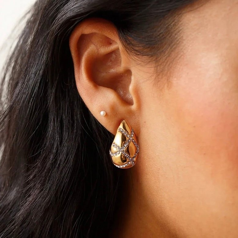 Diamond Bodega Earrings — gold-plated zircon earrings, angled view