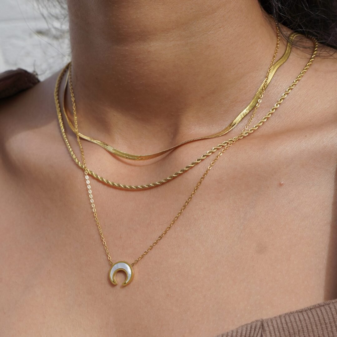 Lucia Chains — layered chains worn at the neck