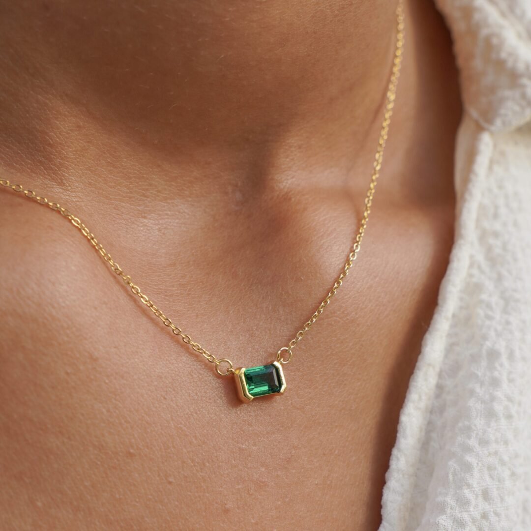 Jade — green stone necklace worn at the collarbone