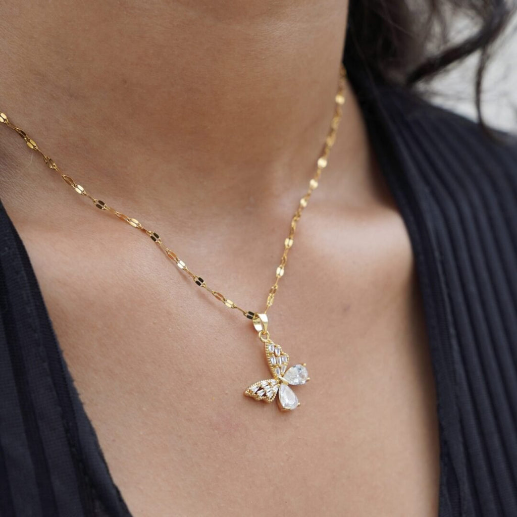 Winx — zircon pendant styled with other necklaces