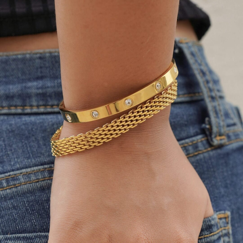 Grace Bracelet — wide gold-plated chain worn on the wrist