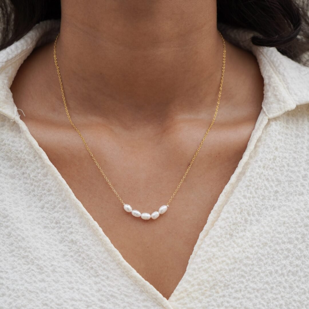 Pearl Necklace — freshwater pearls worn at the collarbone