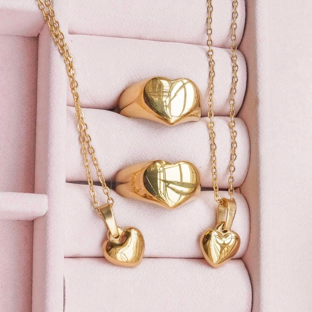 Heart of Gold — gold-plated heart necklace styled flat lay