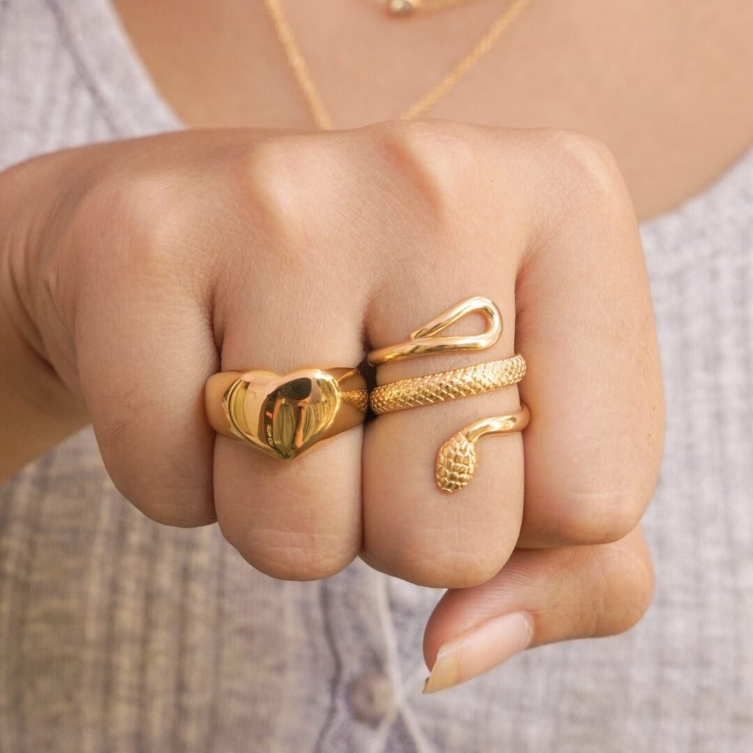 Cobra — snake ring worn wrapped on the finger