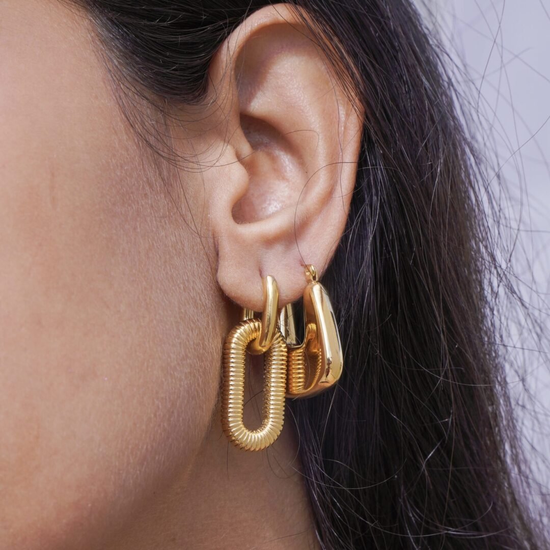 Bianca Hoops Gold — gold hoops worn on the ear