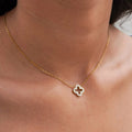 Clover Necklace Hollow — open-cut clover pendant in 14k gold-plated stainless steel, front view