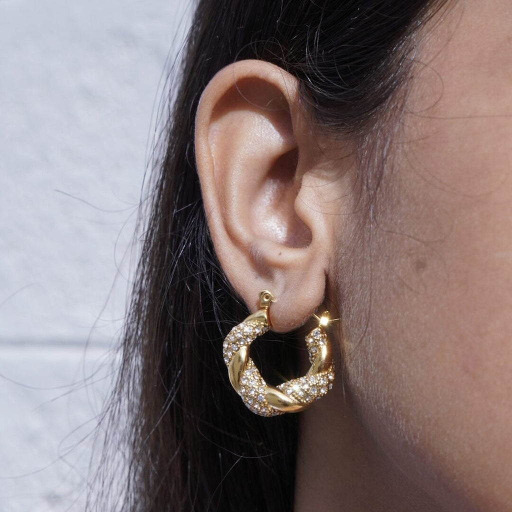 Beverley Hoops — zircon-set gold-plated hoops worn on the ear