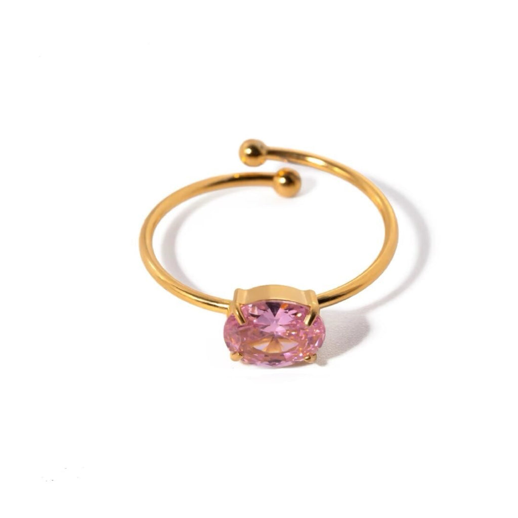 Pink Spark Ring — adjustable pink zircon ring in 18k gold-plated stainless steel, front view