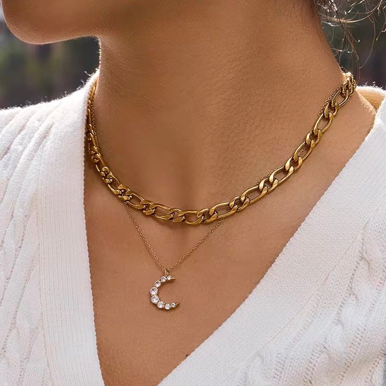 Luna — gold moon pendant styled on model