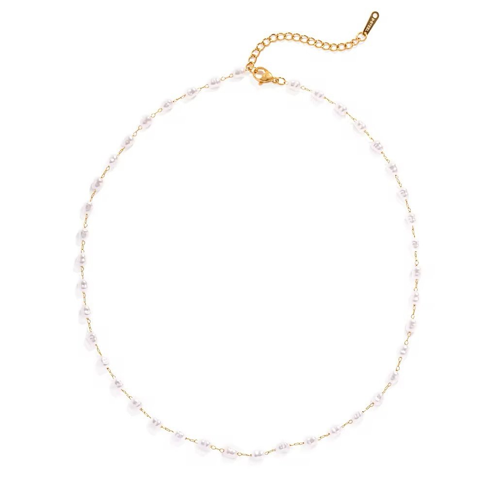 Mother of Pearls — shell pendant worn at the collarbone