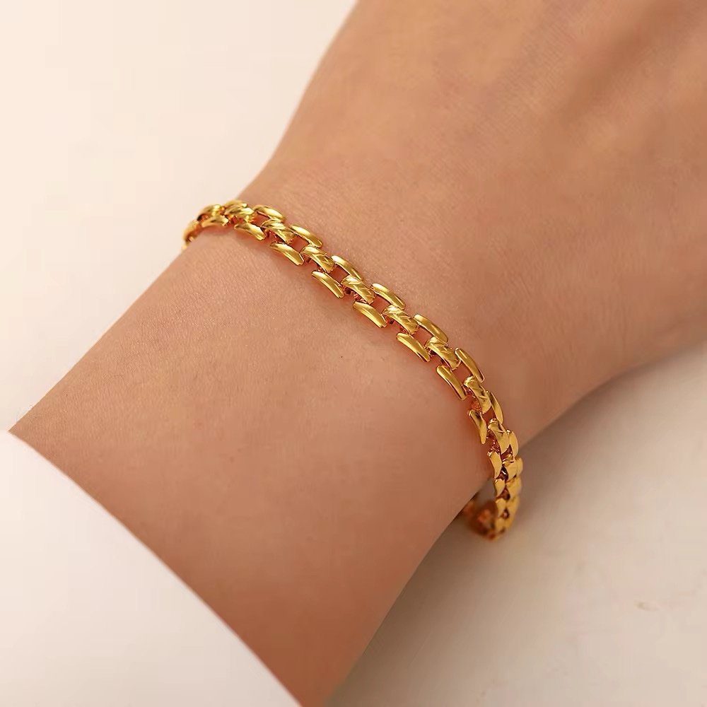 Weave — woven chain bracelet worn on the wrist