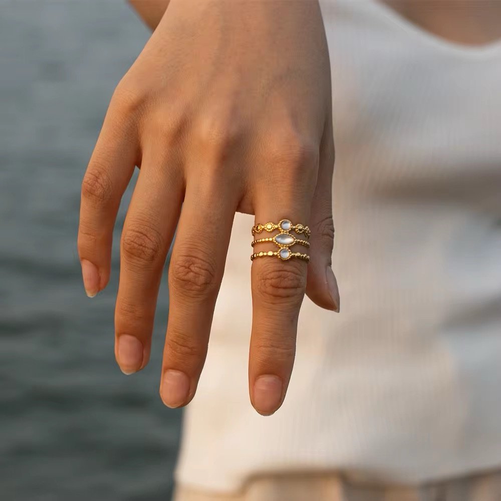 Opalite — gold opalite ring at an angle