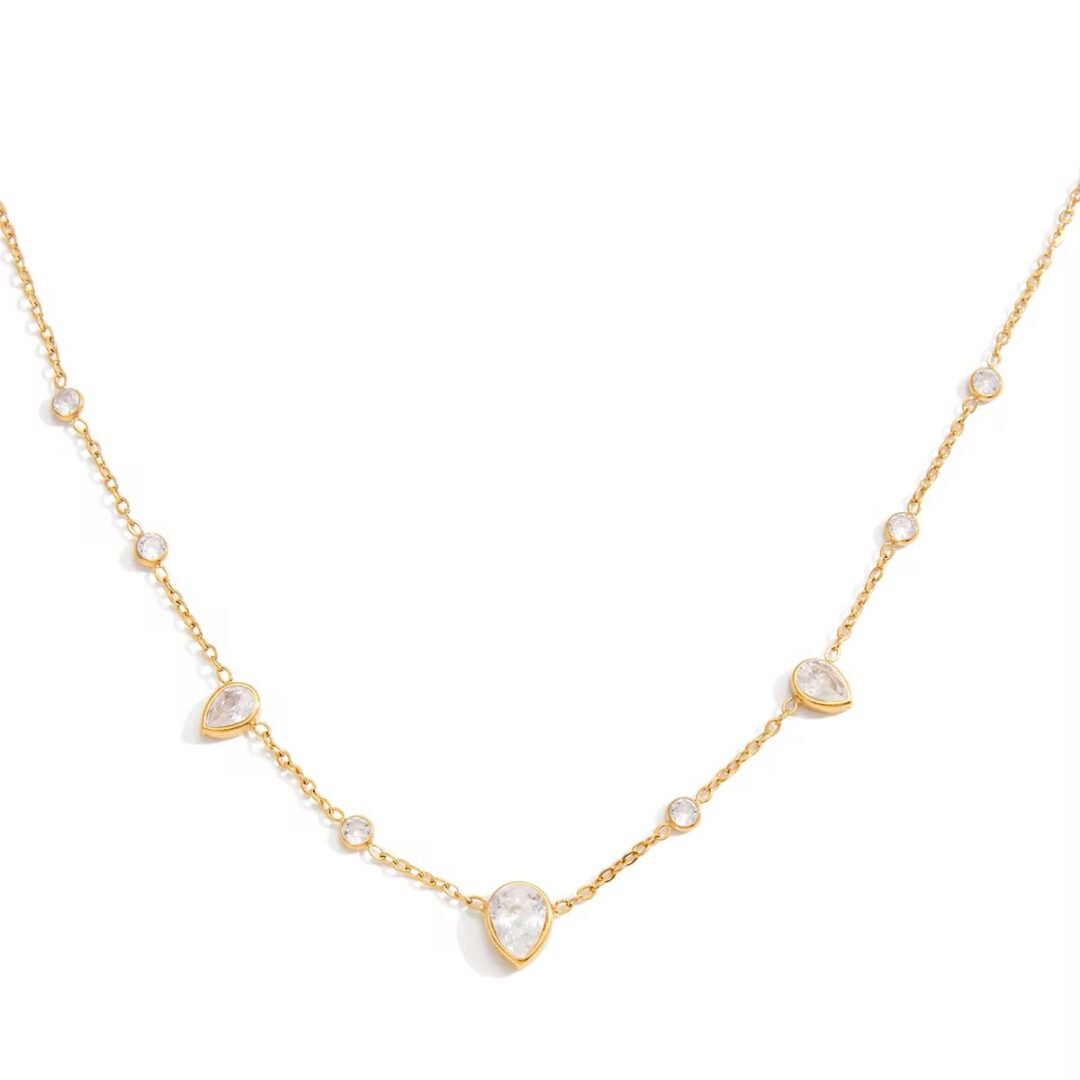 Her Majesty — zircon statement necklace worn at the neckline