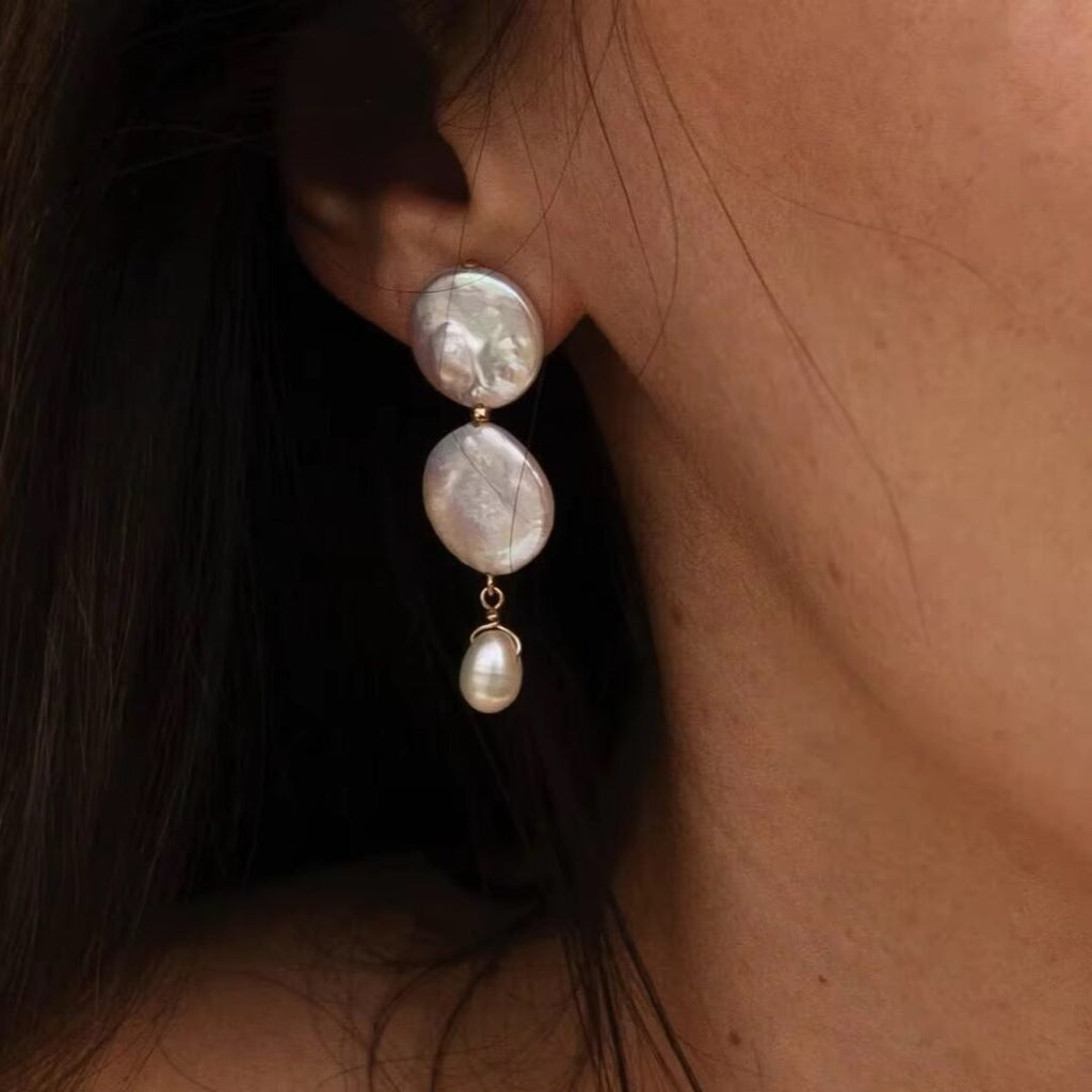 Lumi Pearl — pearl earrings worn on the ear