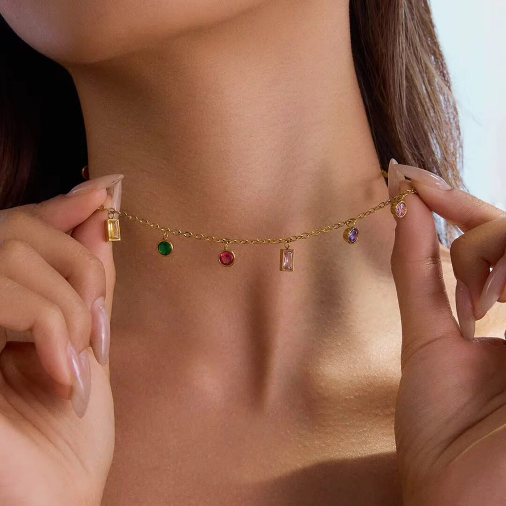 Kaleidoscope — zircon necklace worn at the collarbone