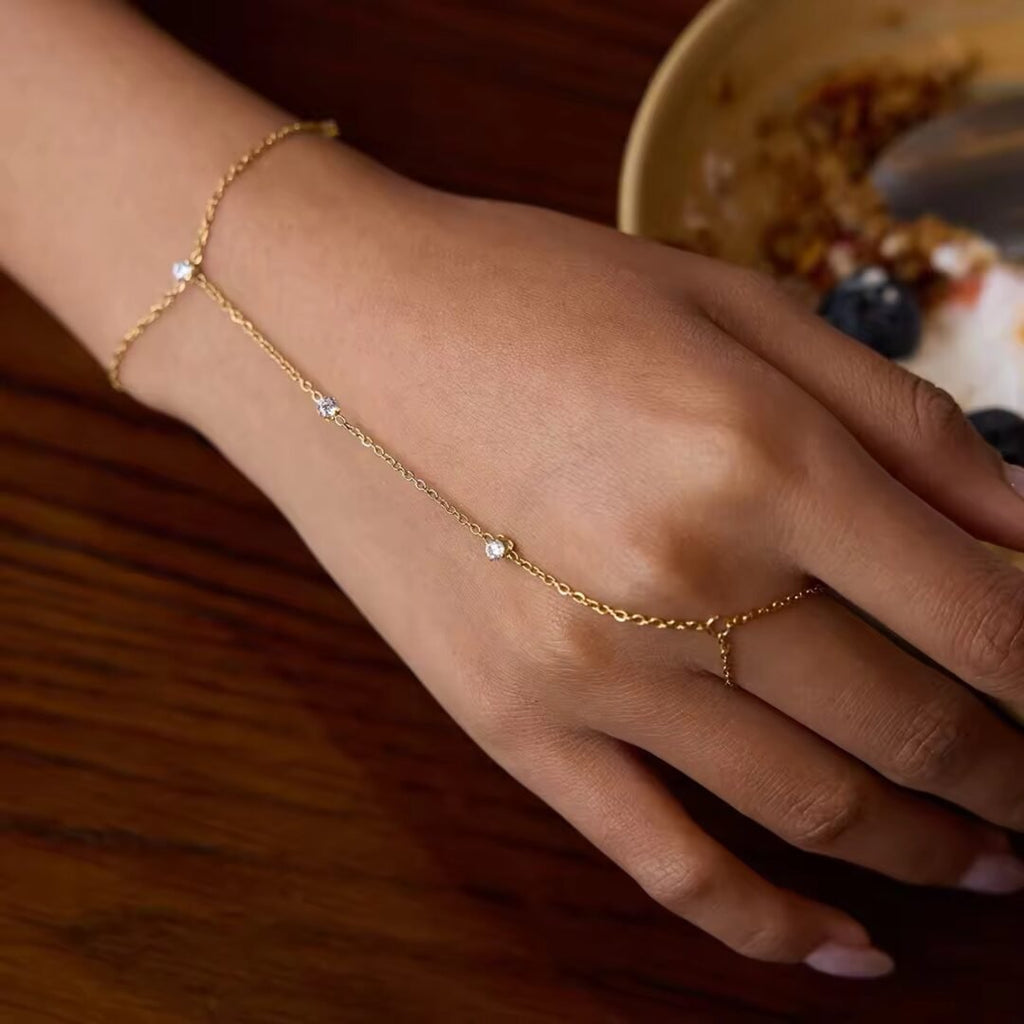 Divette Hand Chain — gold-plated hand chain, flat lay