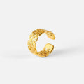 Webster Ring — adjustable woven-texture ring in 18k gold-plated stainless steel, front view