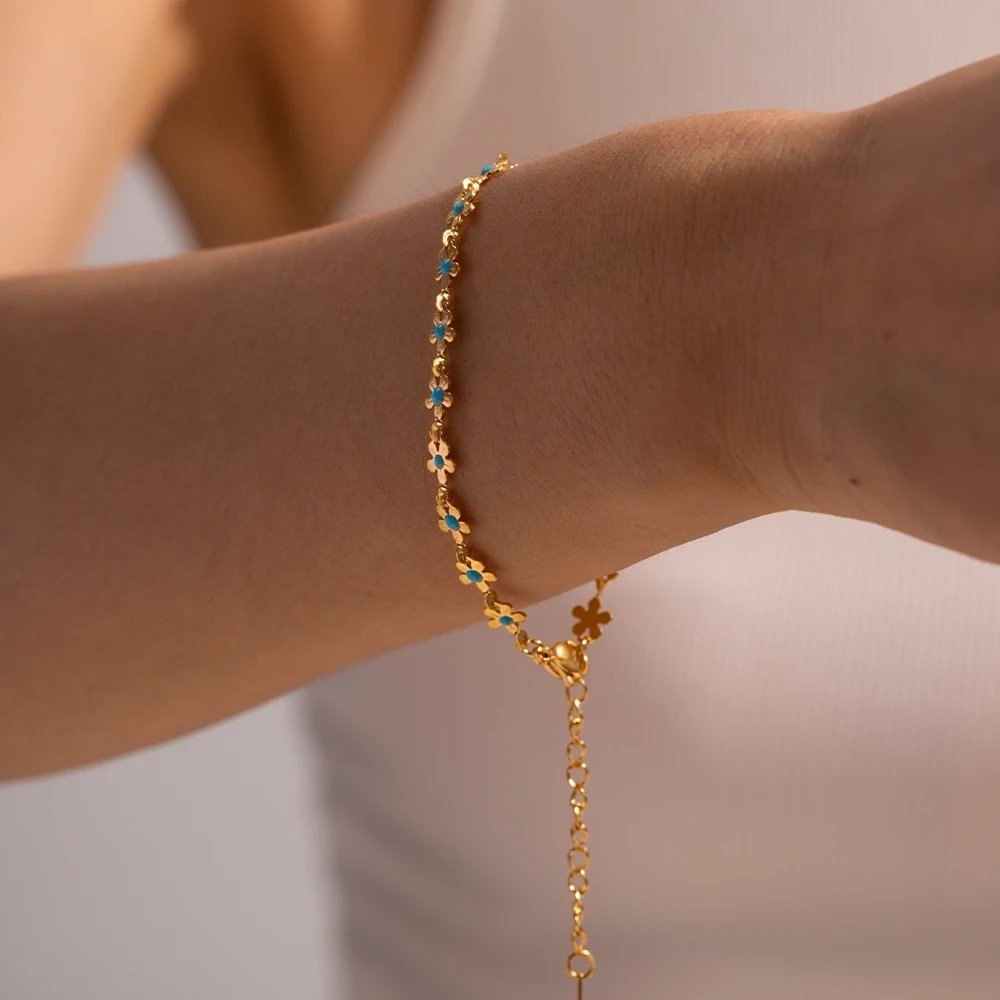 Petunia Bracelet — gold-plated chain bracelet worn on the wrist