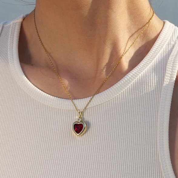 Heart on Fire — zircon heart necklace worn at the collarbone