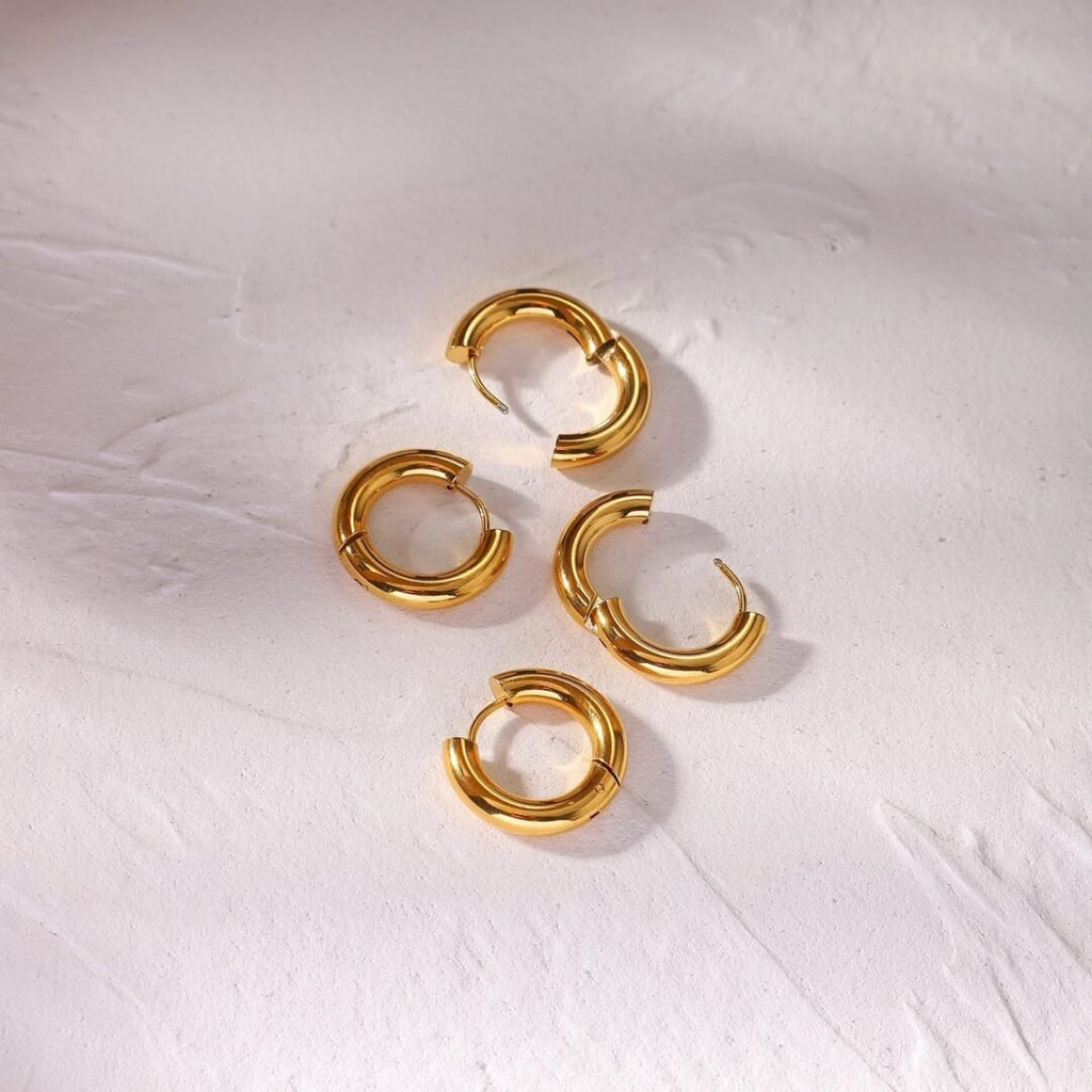 Basic Tube Hoops Small — close-up of 18k gold plating and smooth tube finish