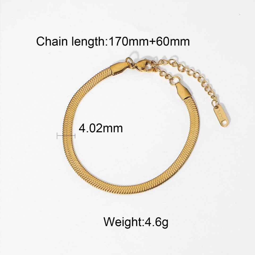 Herringbone Bracelet — gold-plated flat chain, styled flat lay