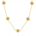 Petite Daisies — daisy charm necklace in 18k gold-plated stainless steel, front view