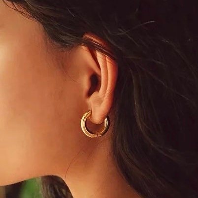 Basic Tube Hoops Small — gold-plated tube hoops worn on the ear