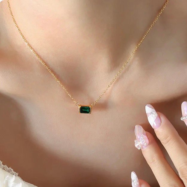 Jade — close-up of deep green zircon pendant